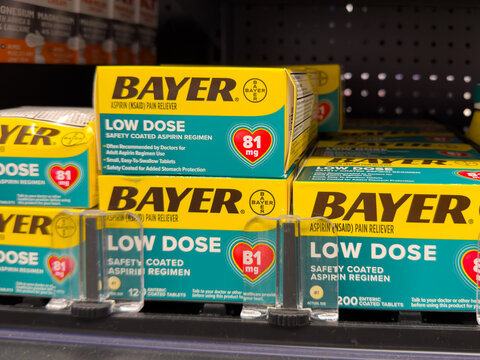 Frisco, Texas, USA - August 31th, 2026: Bayer low dose aspirin boxes standing on Walmart pharmacy shelf