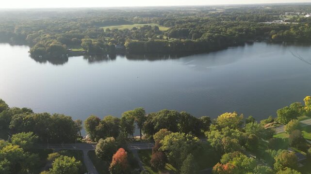 Aerial over Lake Chapin, along the St. Joseph's River. Berrien Springs, within the Oronoko Charter Township, Michigan. Rural community with farms and lakeside / riverside properties.