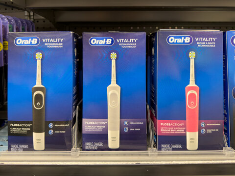 Frisco, Texas, USA - August 31th, 2026: Oral-B Vitality rechargeable electric toothbrushes in blue packaged boxes sitting on Walmart pharmacy display