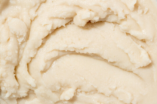 Shea body butter texture close up cosmetic cream background.