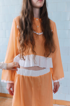 Stylist Adjust Model Dress on Photoshoot