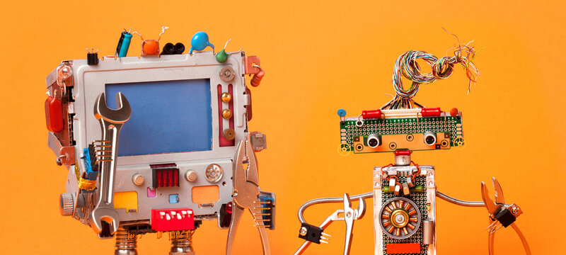 Robot electric repair duo with tools: computer robot holding wrench and pliers, handyman with metal pliers and tongs