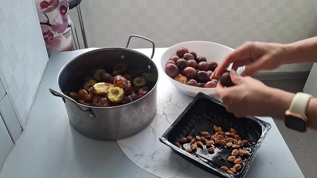 Preparing fruits in the kitchen for making preserves