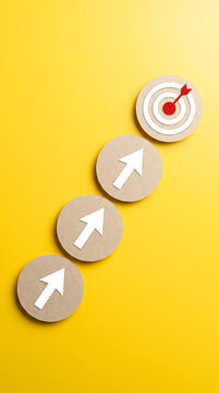 Upward progression target illustration with arrow symbols on yellow background
