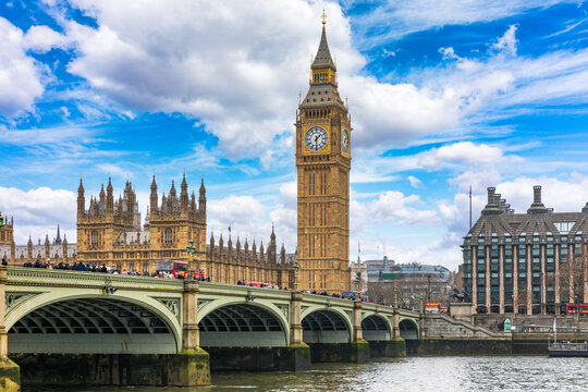 Big Ben and the Palace of Westminster in London, United Kingdom, with Gothic Revival architecture reflected in the River Thames, symbolizing British heritage and iconic landmarks.