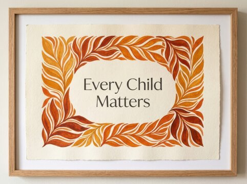 Orange Leaf Border with Every Child Matters Text on Textured Paper in Wooden Frame