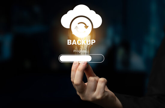 A hand presents a virtual cloud backup icon displaying a loading progress bar, symbolizing data protection and backup solutions in a tech-driven environment. Ledger