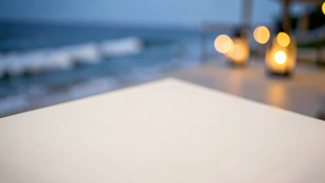 Honed Grey Concrete Table Surface on Chic Rooftop Lounge with Ambient Warm Uplighting Luxury City Bo