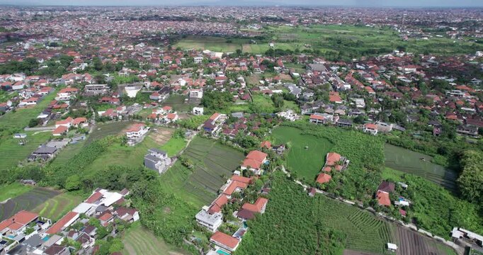 Bali faces challenges of overpopulation and development impacting agriculture and nature in Indonesia