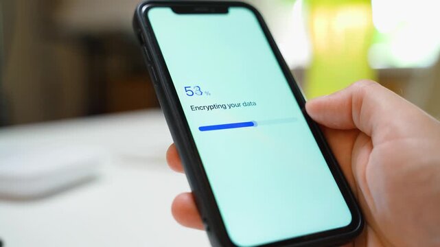 Data encryption progress on smartphone from zero to completed. Data encrypted confirmation screen with green progress bar