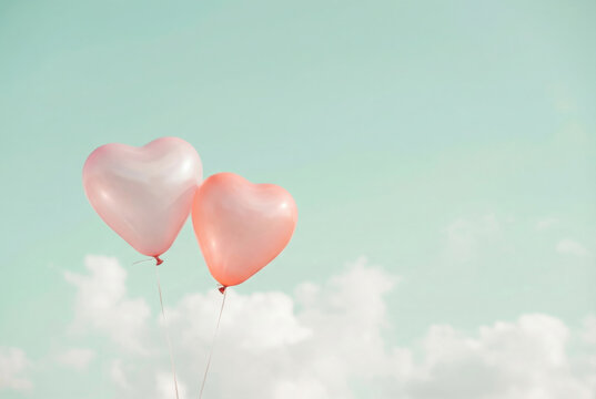 Floating Heart Balloons in Sky Love Freedom Concept