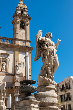Angel statue in front of the Cathedral of Palermo.