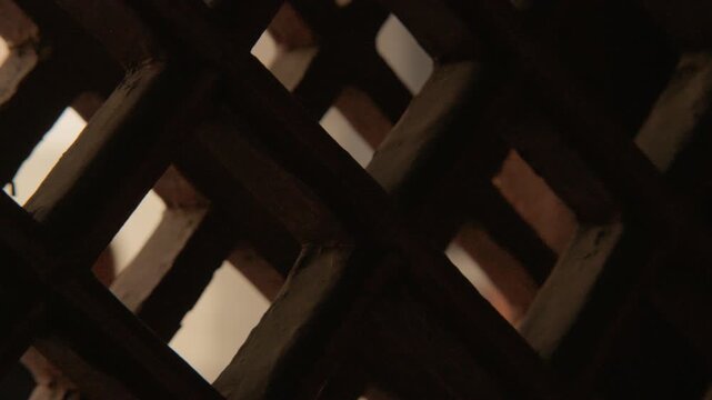 Wooden Lattice Window and Soft Light Inside Lama Temple Beijing China