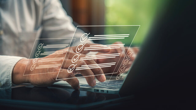 Digital Checklist Concept with Businessman Typing on Laptop Keyboard.