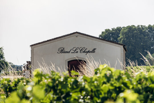 Saint-Laurent-des-Combes, France &ndash; July 12, 2026: Chateau Beard La Chapelle winery building among vineyards near Saint Emilion in the Bordeaux wine region.