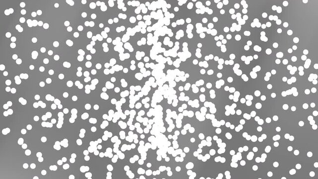 Gray background featuring numerous circular dots scattered across a smooth light gradient.