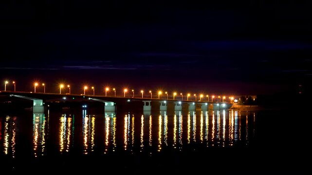 Perm, Russia. Communal bridge over the Kama river in Perm. Night view
