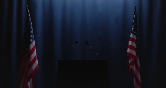 Empty podium with American flags lights up