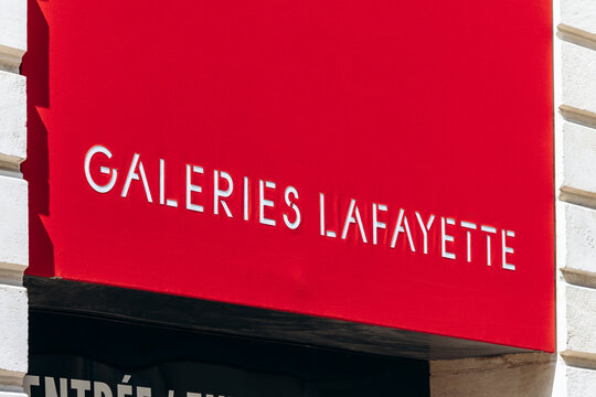 Bordeaux, France - July 14, 2026: Galeries Lafayette sign on the red exterior facade of the department store in central Bordeaux