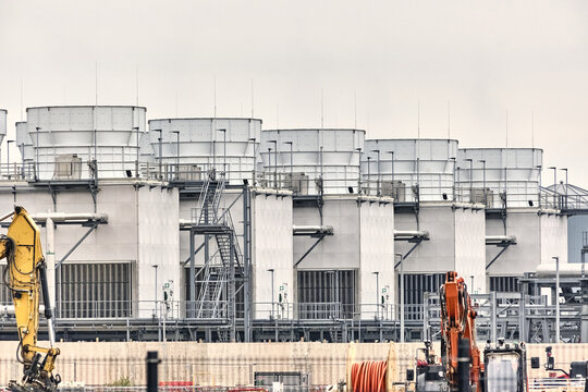 Taulov, Denmark - 28 August 2026: View of the Google Data Center construction site featuring large industrial cooling towers and heavy machinery.