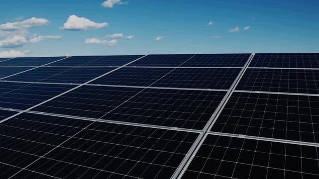 Even rows of photovoltaic modules create a geometric pattern and demonstrate modern solar technology.