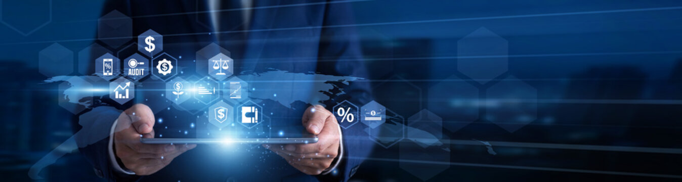 Audit. Financial inspectors using tablets reviewing digital transactions records and compliance verification charts on glowing high-tech screens. Audit and corporate transparency management.