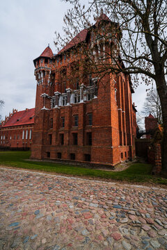 Malbork, Pomeranian Voivodeship, Poland - 23 March 2026: View of the historic Malbork Castle, a massive red-brick Gothic fortress with intricate architectural details.