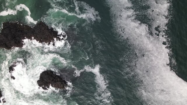 Atlantic waves breaking over a rugged Icelandic coast