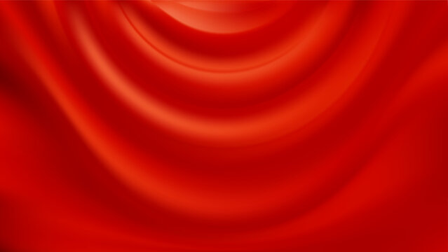 Red silk background. Draped satin fabric. Smooth flowing folds.