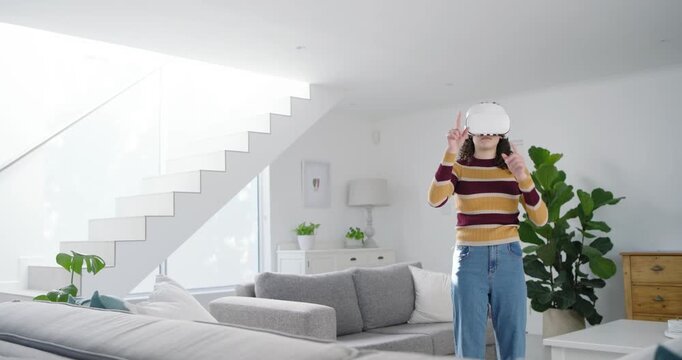 African American teen woman in sweater putting on VR headset exploring content at home, copy space