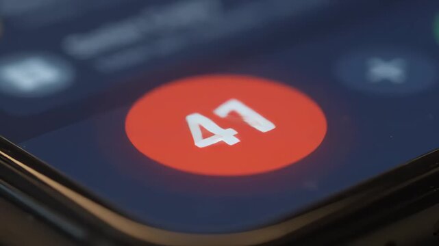 Smartphone screen displaying a red notification circle with the number 41 in close up view