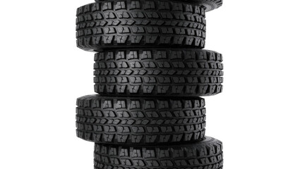 Stack of four black rubber car tires, isolated on transparent background © James