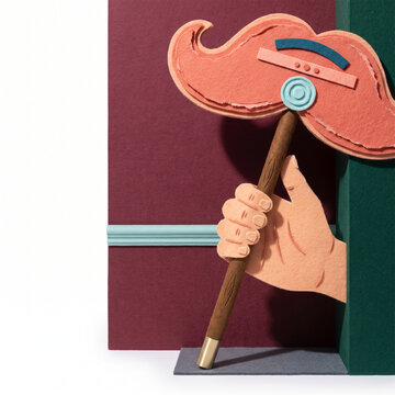 Mustache on a stick prop held by a hand against a colorful background  