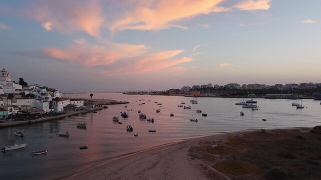 Ferragudo portugal fishing village harbor aerial sunset
