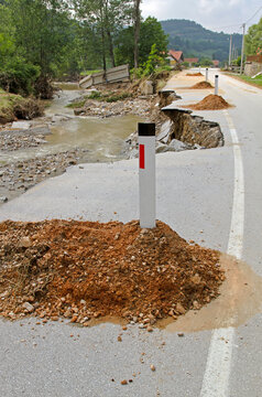 Dangerous Road Erosion Caused by River Flash Flooding Natural Disaster