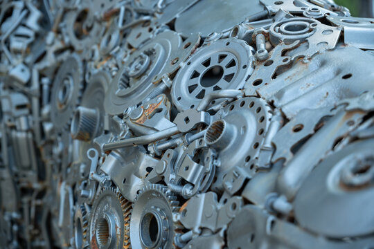 Close-up of welded metal parts forming a compact unit.