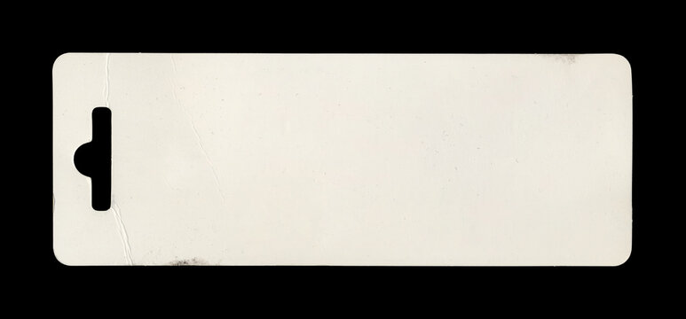 Cream paper tag with vertical slot near left edge and rounded corners