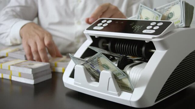Business man working with cash in office. Businessman counting money. Accountant businessman count dollars money in office. Banker working In office. Financial success. Finance and accounting concept.