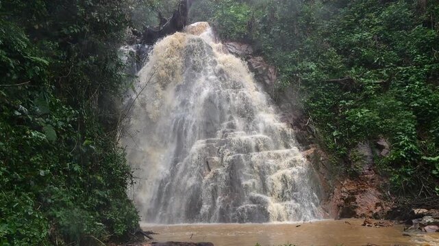 Waterfall in slow motion on a dangerously flooded river in the Amazon. Rio Narupayacu at 1,200m elevation in the Amazonian foothills of the Andes in Napo province, Ecuador