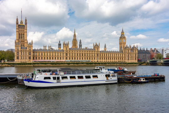 Houses of parliament and Big Ben tower with Thames river, London, UK