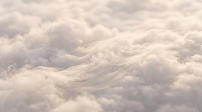 Aerial View of Fluffy Clouds in Warm Sunlight