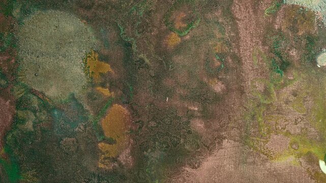 Macro timelapse of copper oxidation and patina formation, revealing evolving pink, red, green, blue and turquoise colors with intricate corrosion patterns and metallic surface textures