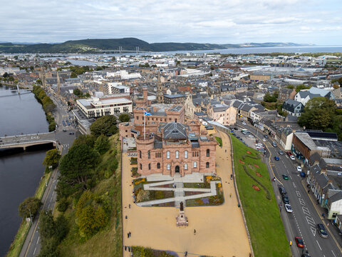High wide aerial view of Inverness Castle, River Ness, Ness Bridge, Kessock Bridge, and Beauly Firth in Inverness-shire, Scottish Highlands, Scotland
