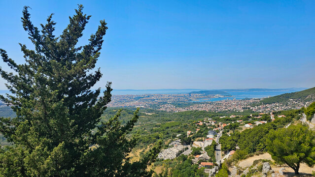 Wonderful photos of a stunning landscape in Croatia, featuring sweeping views, arid terrain, and endless expanses with water and buildings