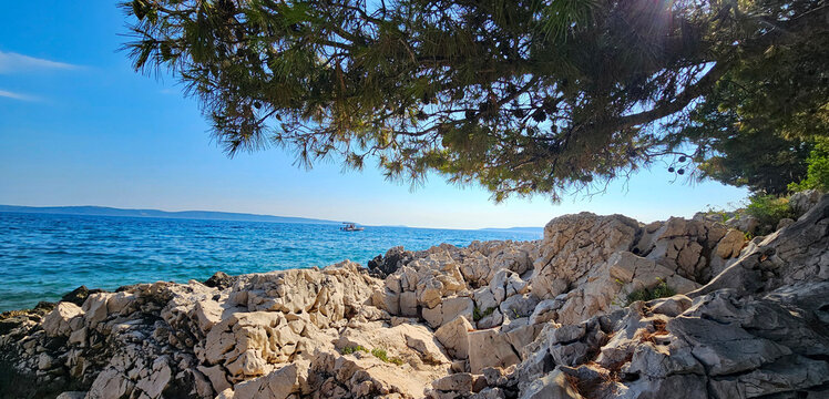Wonderful photos of a stunning landscape in Croatia, featuring sweeping views, arid terrain, and endless expanses with water and buildings