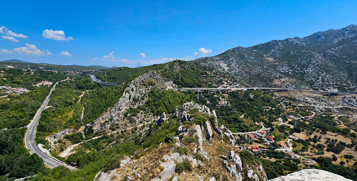 Wonderful photos of a stunning landscape in Croatia, featuring sweeping views, arid terrain, and endless expanses with water and buildings