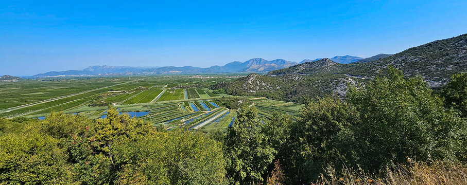 Wonderful photos of a stunning landscape in Croatia, featuring sweeping views, arid terrain, and endless expanses with water and buildings