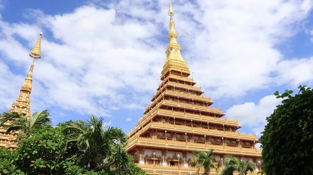 Scenic video views of sculptures set against beautiful skies at Wat Phra That Nong Waeg and Wat Thung Setthi in Khon Kaen, Thailand.