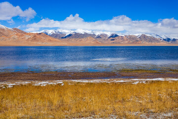 Rangkul lake and Pamir mountains near Murghab town, Tajikistan