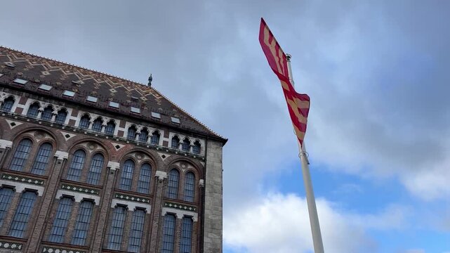Hungarian arpad striped flag waving in budapest wind